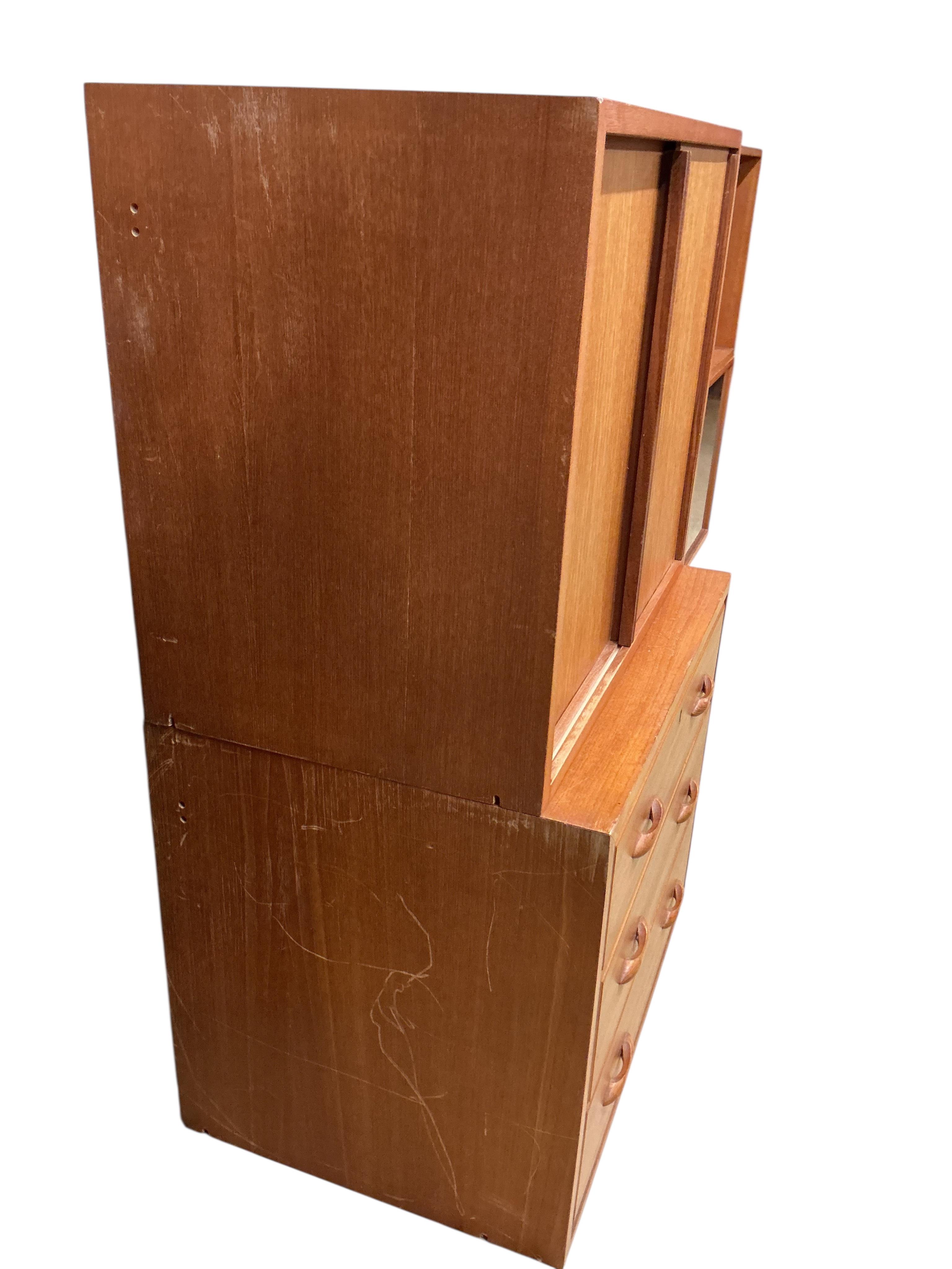 A Ladderax unit with wooden doors, larger width 59cm, depth 40cm, height 47cm together with a drawer unit